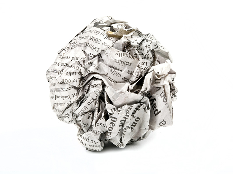Crumpled newspaper ball