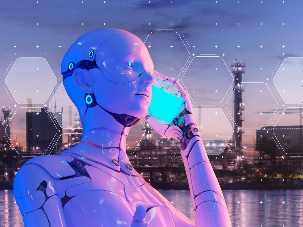 In a collage-like illustration, a white robot talks on a cellphone with a fossil fuel plant in the background.