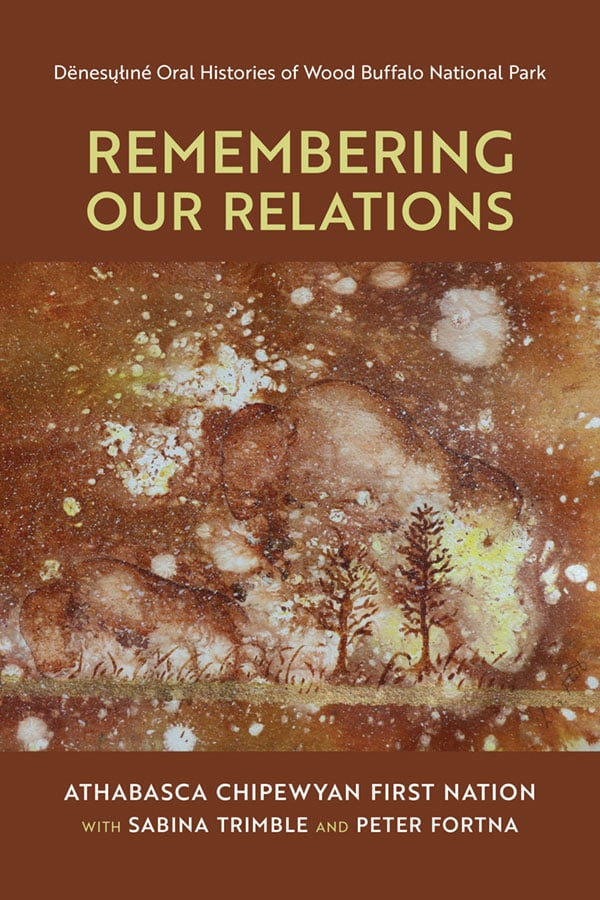 The cover of 'Remembering Our Relations,' which is in brown hues and features a stone painting of buffalo.
