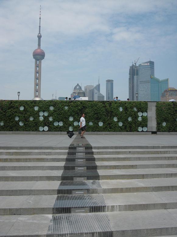 582px version of A man walking on The Bund in Shanghai