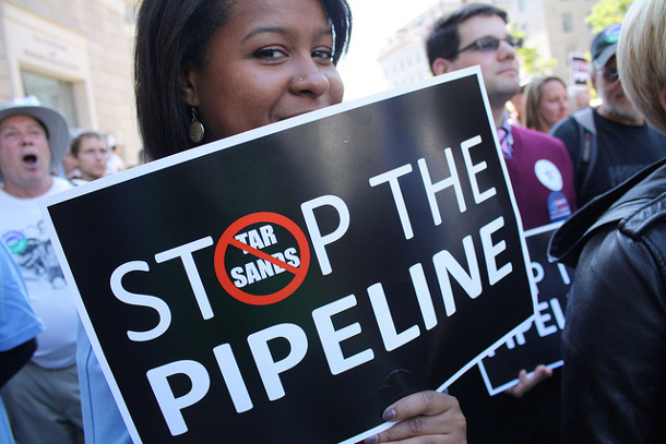 Protesters at a Keystone XL oil pipeline hearing rally