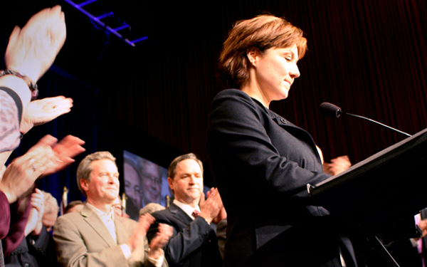 Christy Clark at podium, after victory