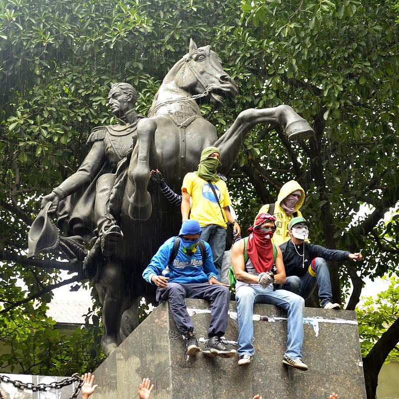 ProtestersBolivarStatue.jpg