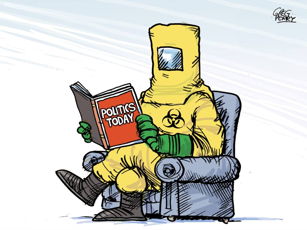 A person wearing personal protective equipment guarding against nuclear exposure sits on a chair reading a book titled “POLITICS TODAY.”