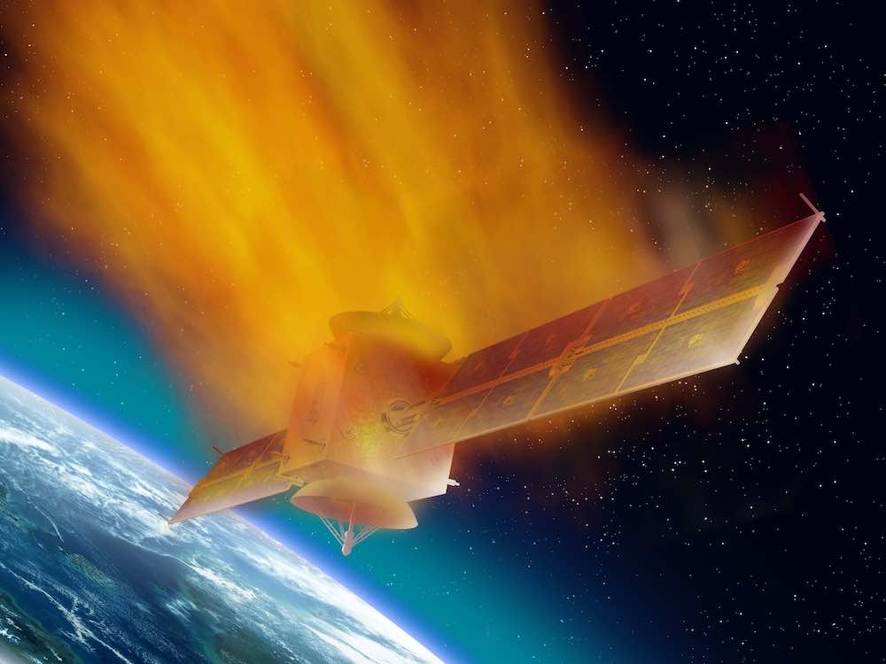 An illustration of a flaming satellite, with large wing structures on each side, burning up as it enters Earth’s atmosphere.