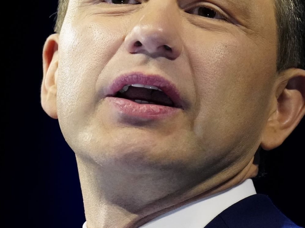 A close-up of Pierre Poilievre’s face as he speaks.