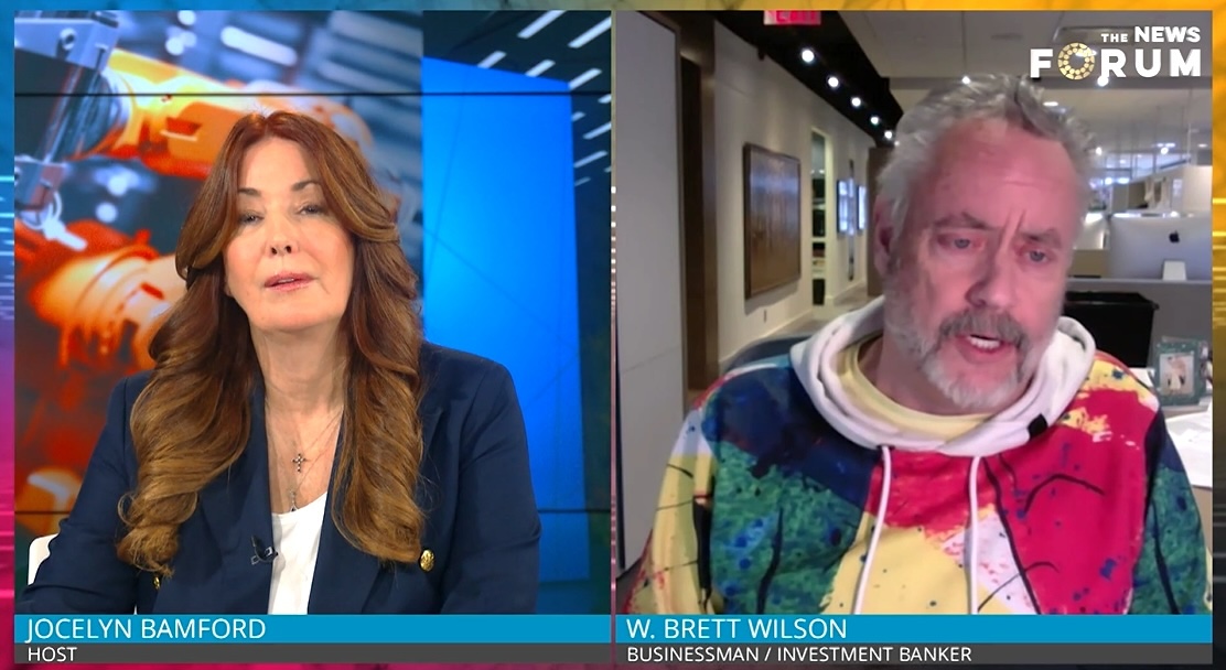 A screen capture shows a pair of images, side by side, one of a brown-haired white woman wearing a blazer, the other of a grey-haired white man wearing a sweatshirt with colourful indistinct patterns on it.