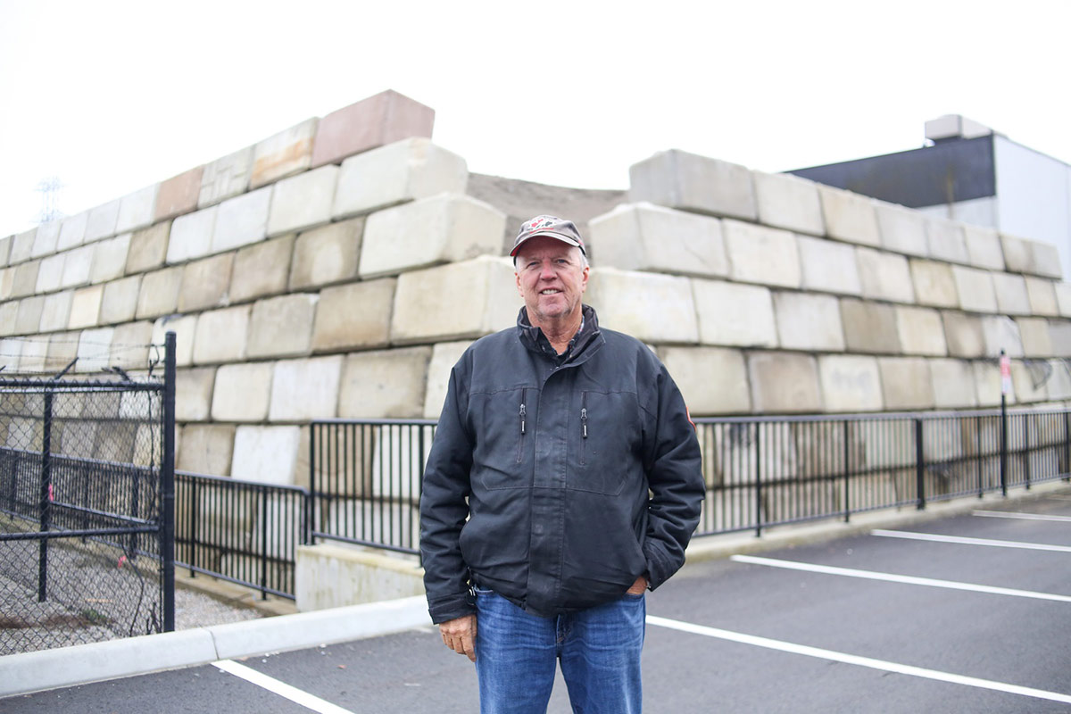 Bruce Mathers started helping his father out with construction site prep and now runs the family business. Photo by Christopher Cheung.