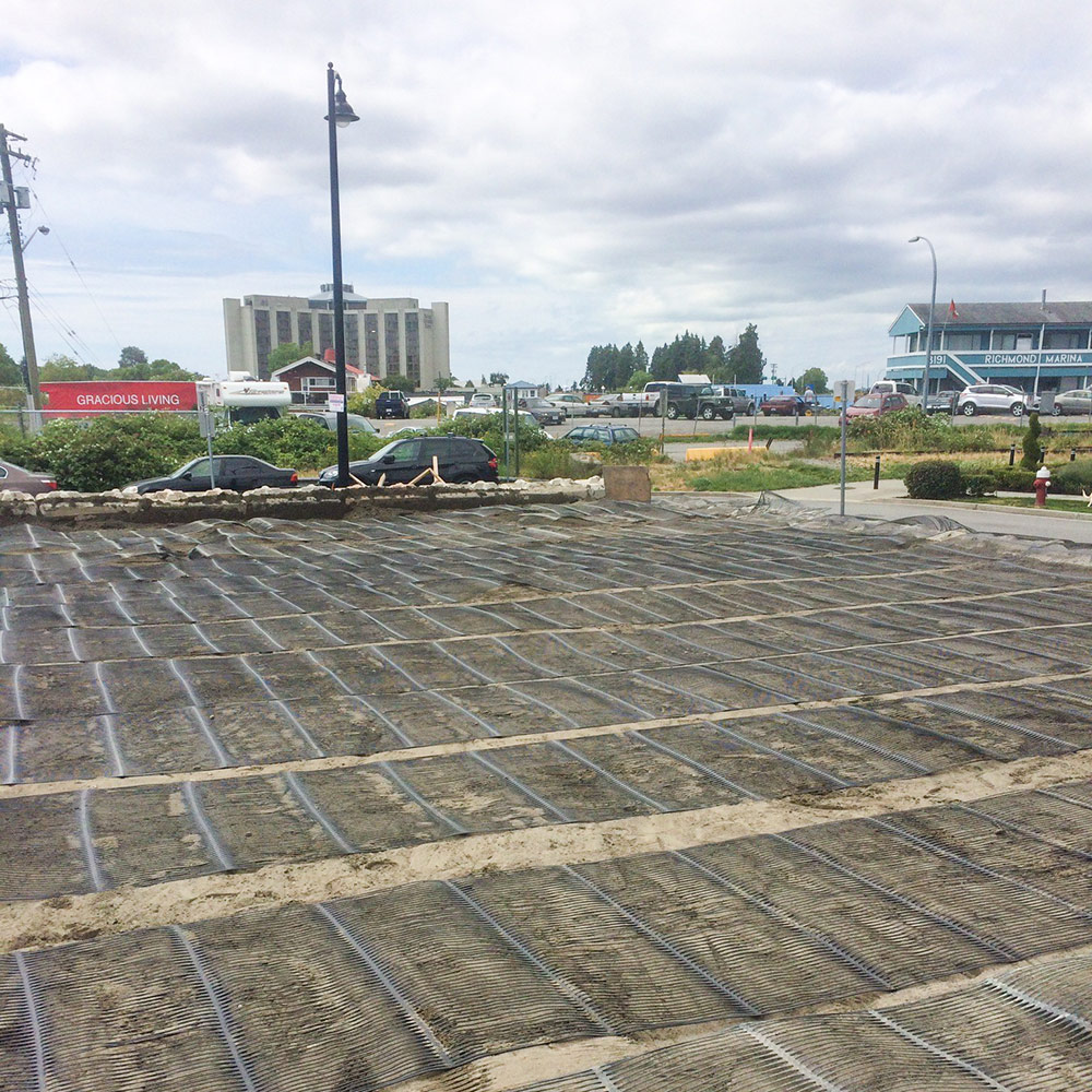 Geogrid is laid to keep the sand in place. Photo courtesy of E. Mathers Bulldozing Co.