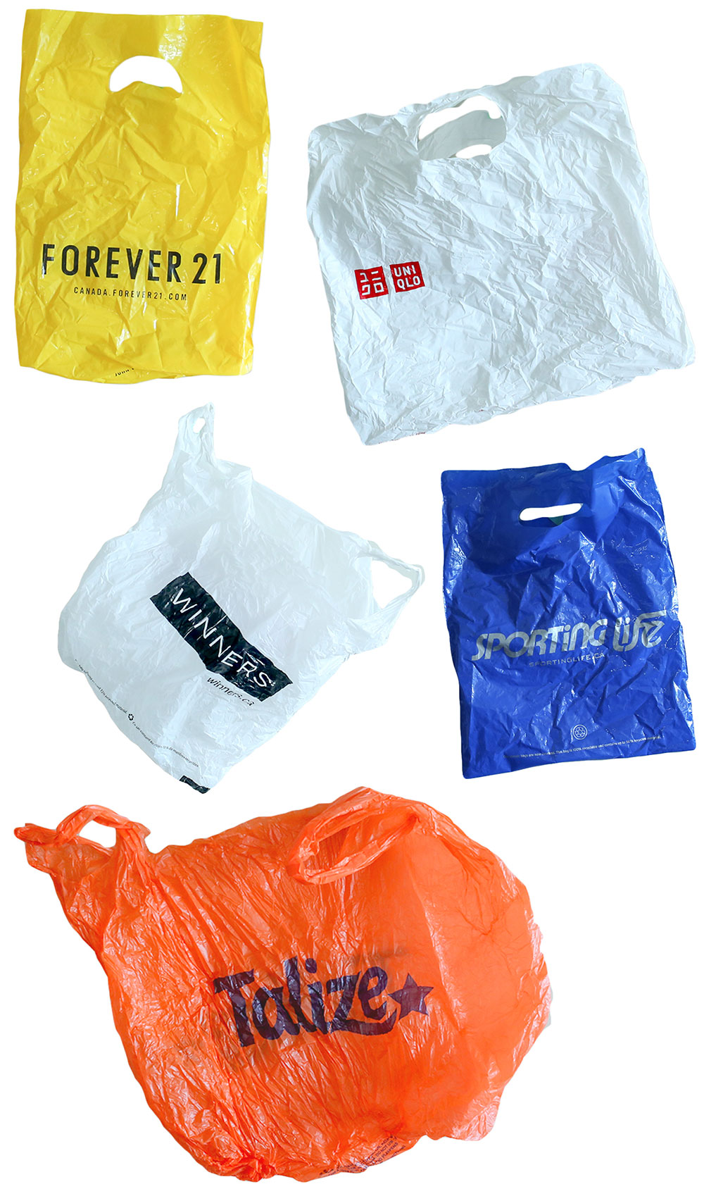 A colourful collection of five plastic bags against a white background.