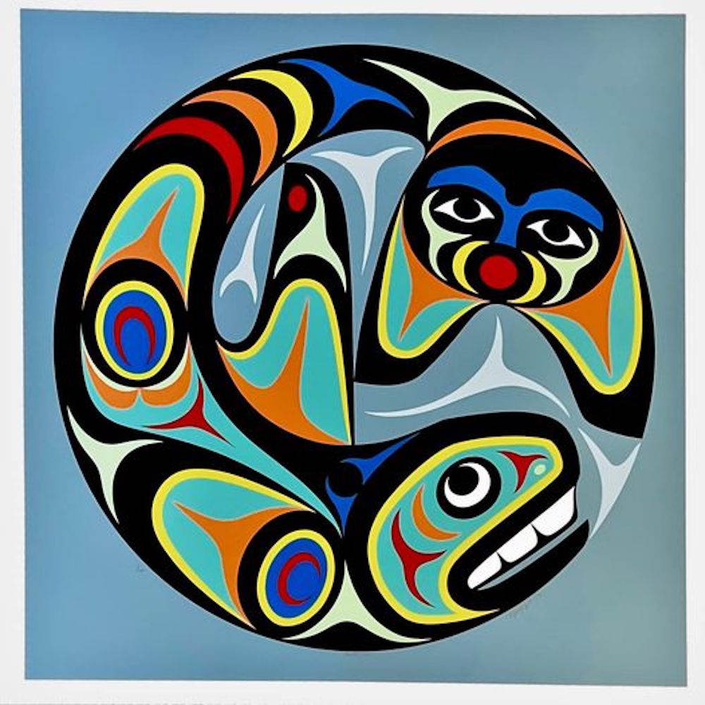 A square piece of Northwest Coast artwork on a light blue background features a circular illustration and rainbow colours.