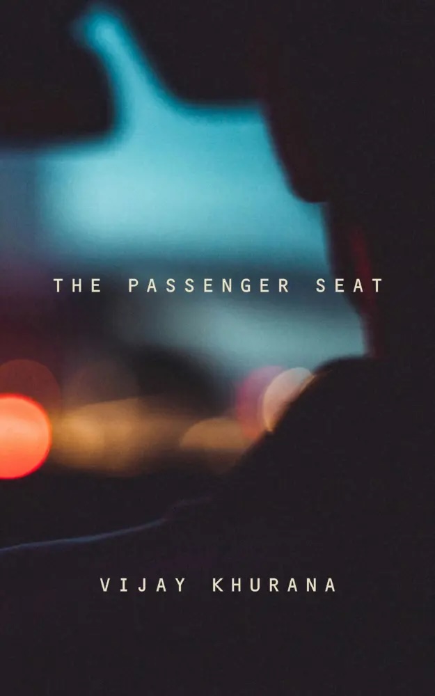 The book cover image for The Passenger Seat by Vijay Khurana features the silhouette of a hand on a steering wheel as viewed from a passenger seat. The lights from traffic out the window are in soft focus.