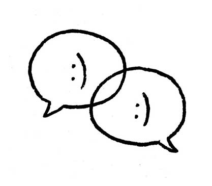 An illustration of two overlapping speech bubbles. In both bubbles are text-format smiley faces, made up of a colon and a parenthesis.