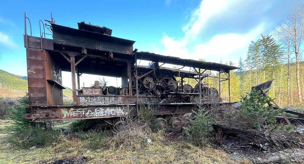 An old, rusting piece of logging equipment.
