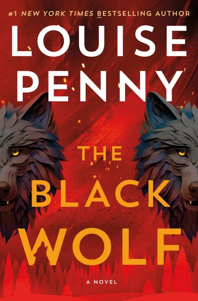 The book cover image for Louise Penny&rsquo;s &lsquo;The Black Wolf&rsquo; features a digital illustration of two grey wolf heads on either side of the frame against a red background.