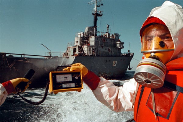 Greenpeace activists confront a ship dumping nuclear waste in the ocean, 1993.