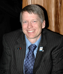 Sam Sullivan (in blue tie at Torino reception)