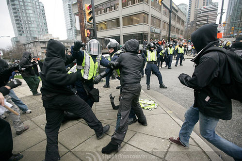 6_protest_attackingpolice-2.jpg