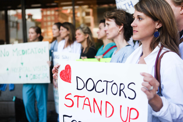 582px version of Refugee health doctor protest