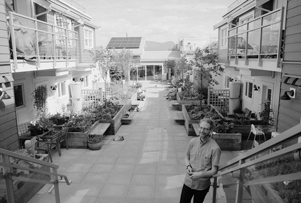 582px version of Andrew Stephens-Rennie in his Vancouver Co-housing building