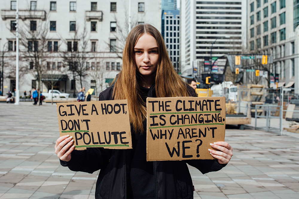 YouthClimateStrike_GirlSigns.jpg