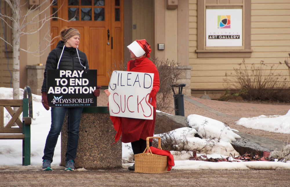 Gilead Sucks sign at protest