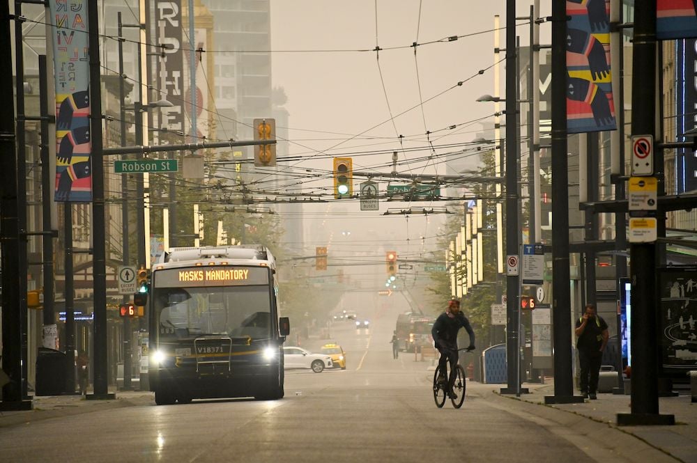 A Vancouver street scene with wildfire smoke obscuring the details.