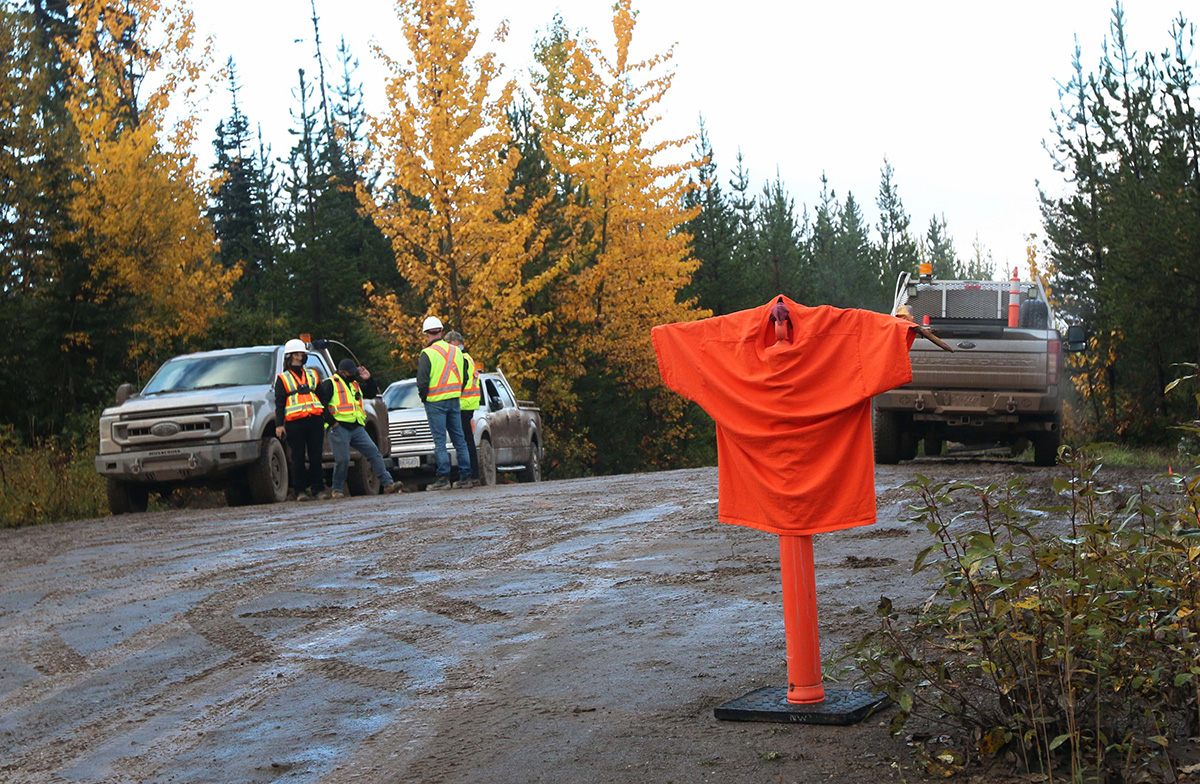 851px version of OrangeShirtMoriceServiceRoadTrucks.jpg