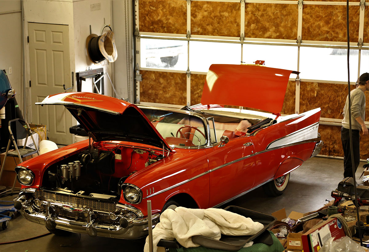 851px version of 57ChevBelAirRedGarageHoodUp.jpg