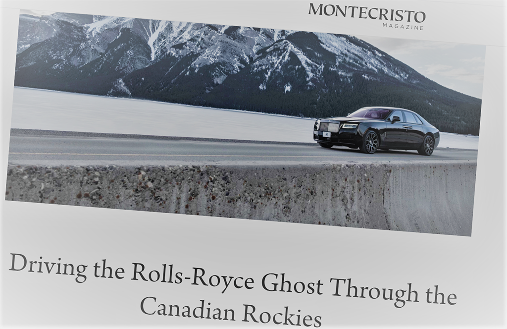 A page from Montecristo Magazine shows an image of a Rolls Royce driving beside a mountain.