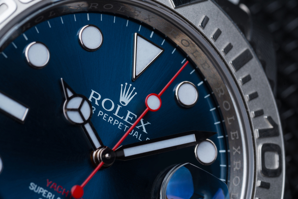 An up-close shot of the face of a Rolex watch.