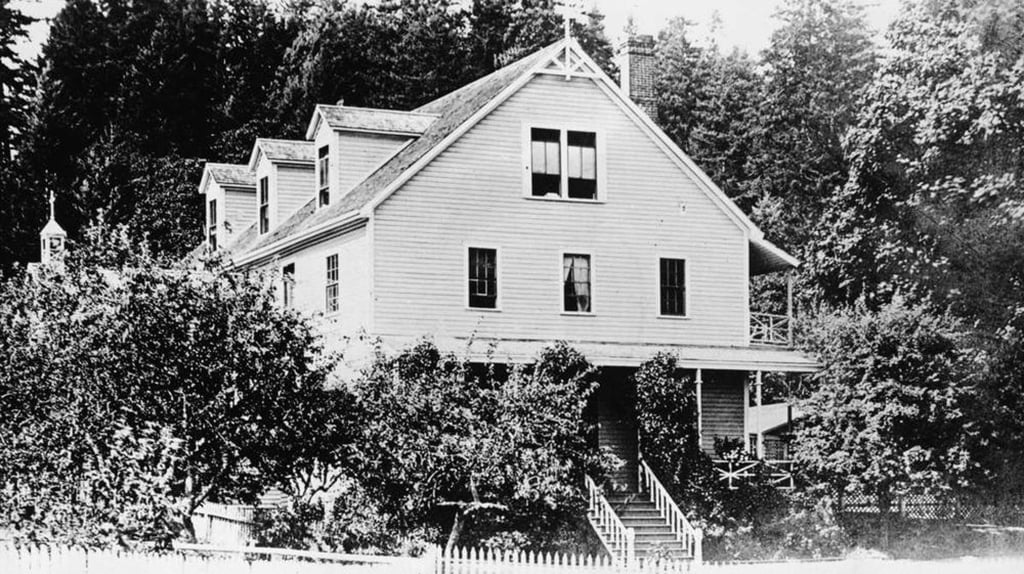 An old, black-and-white photo of St. Ann's day school in 1964.