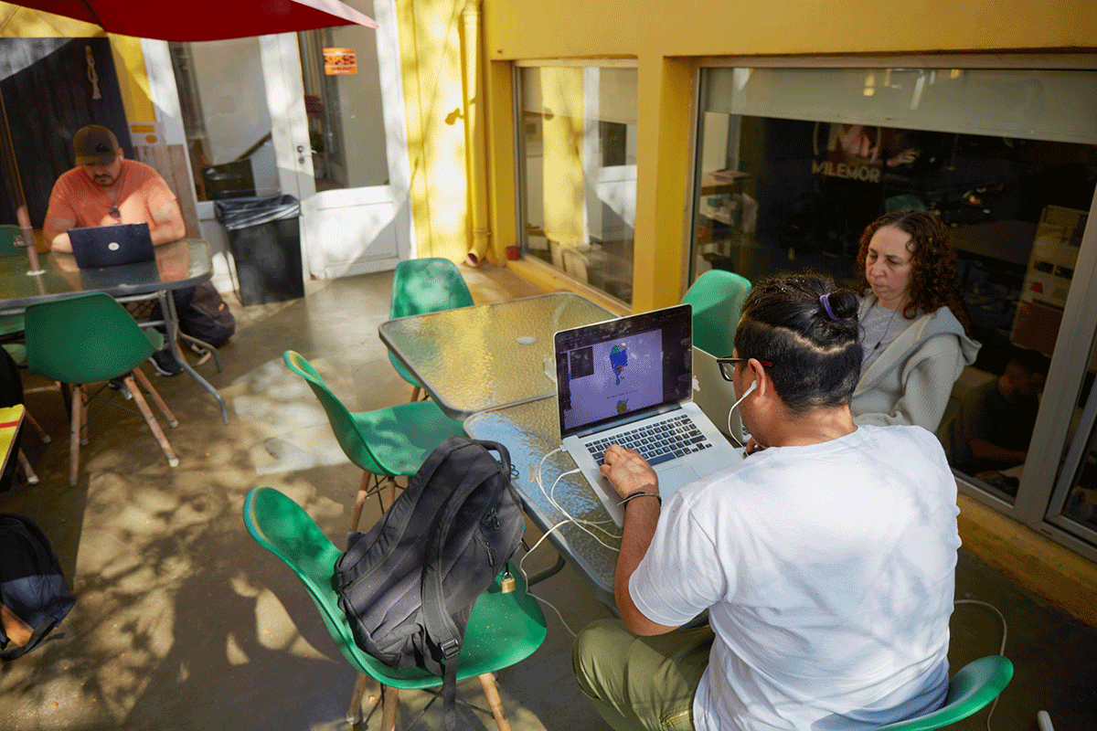 Several people work out of the Urban Station, a co-working space in the Palermo Hollywood neighbourhood of Buenos Aires.
