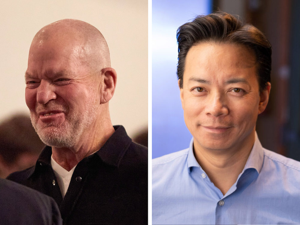 Chip Wilson, with a shaved head and stubbly grey beard and wearing a black shirt, is captured grimacing on the left. Ken Sim, with a tidy haircut and blue collared shirt, gazes at the camera on the right.
