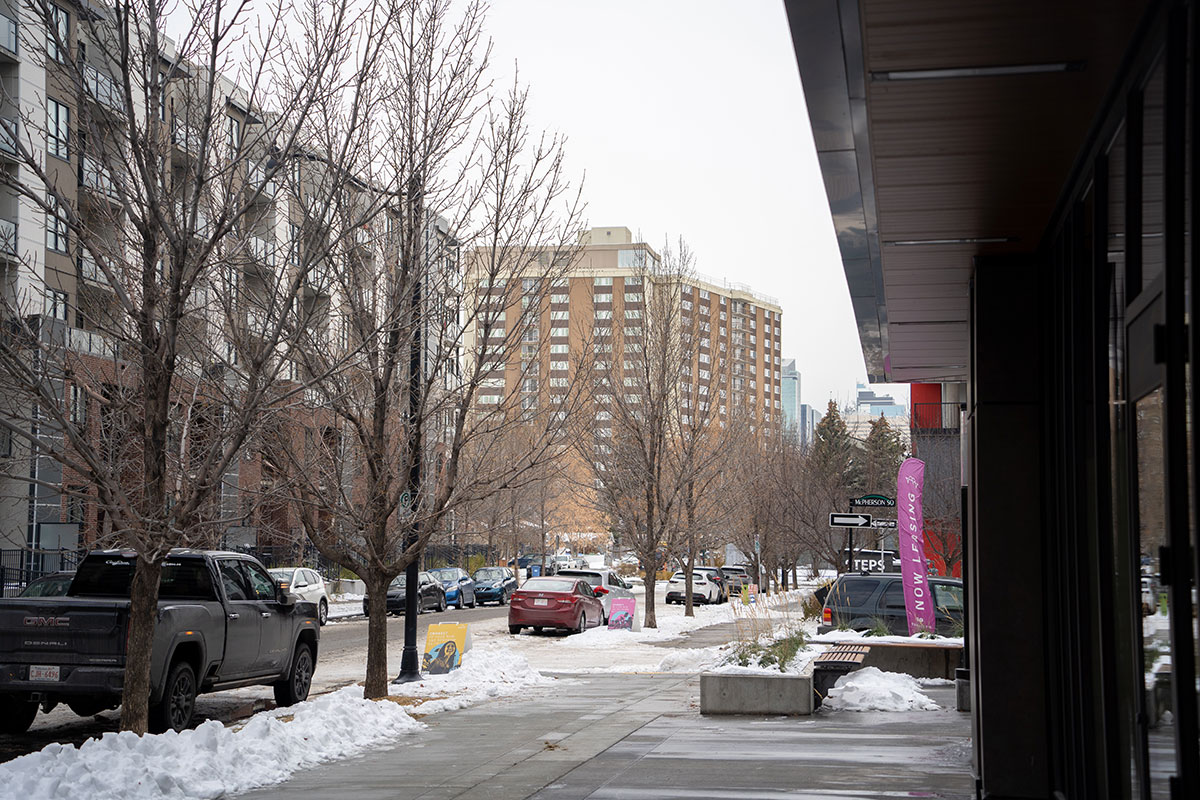 Bridgeland Place as seen from McPherson Road, surrounded by other buildings in November 2022.