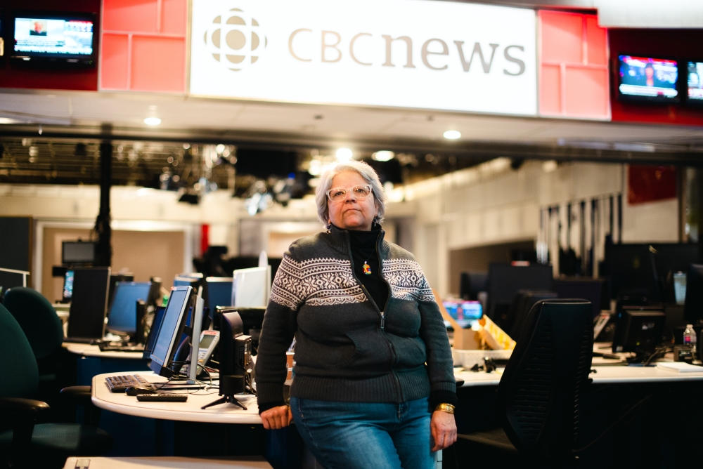 Sujata Berry, producer for CBC Radio’s White Coat, Black Art' and lead of the CBC Temp Project, poses for a portrait in the newsroom for CBC News Network.