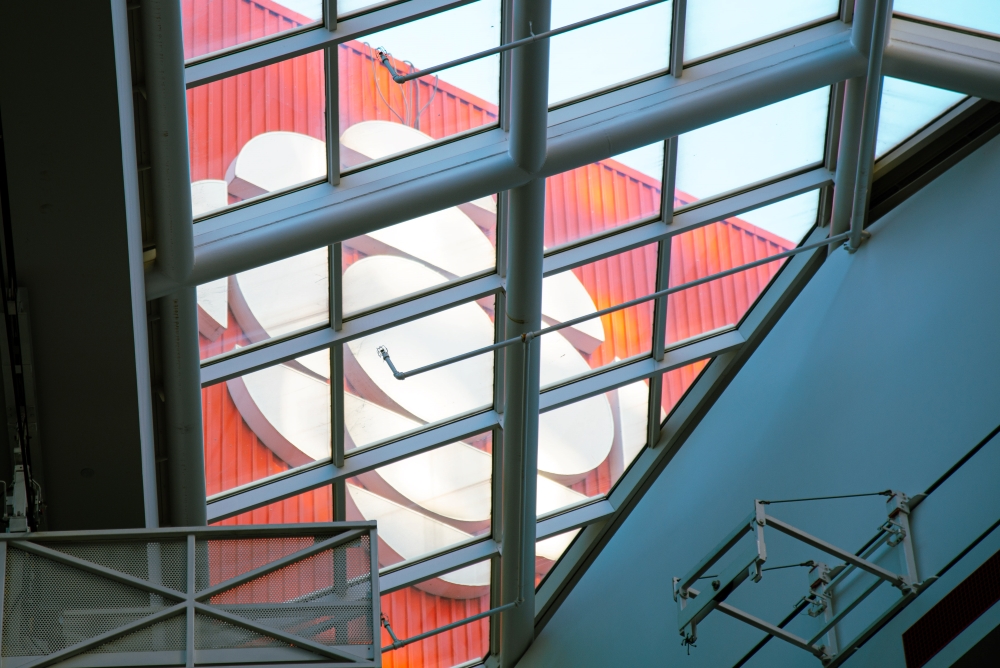 This CBC logo is found on the roof of the CBC Toronto headquarters at 205 Wellington St. W., seen through a window on the building’s top floor.