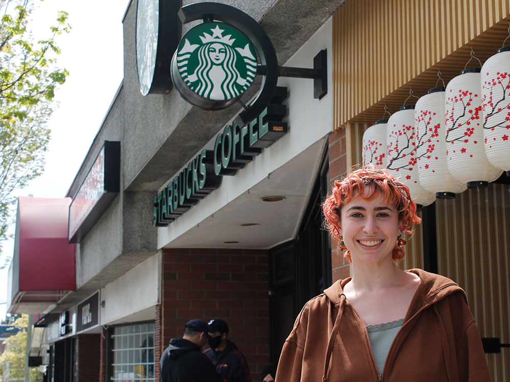 Frédérique Martineau stands outside a Starbucks outlet.