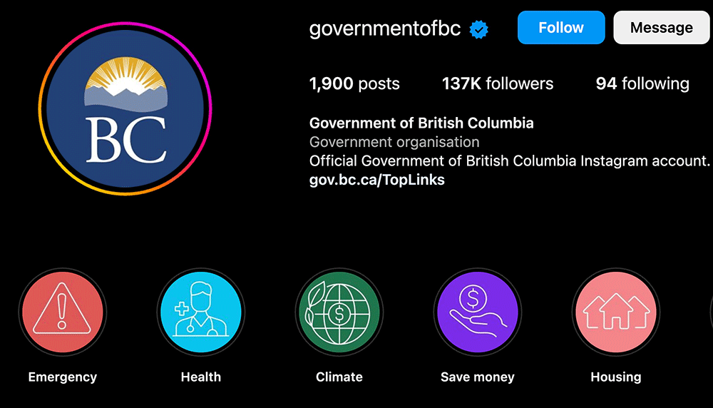 A screenshot of the B.C. Government’s Instagram feed features the British Columbia government’s blue logo in a circular avatar against a black background. A row of colourful circular icons titled “emergency,” “health,” “climate,” “save money” and “housing” across the bottom of the frame.