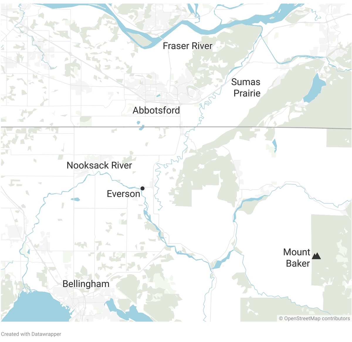 A map shows the Nooksack River running westwards from its mouth to the ocean near Bellingham.