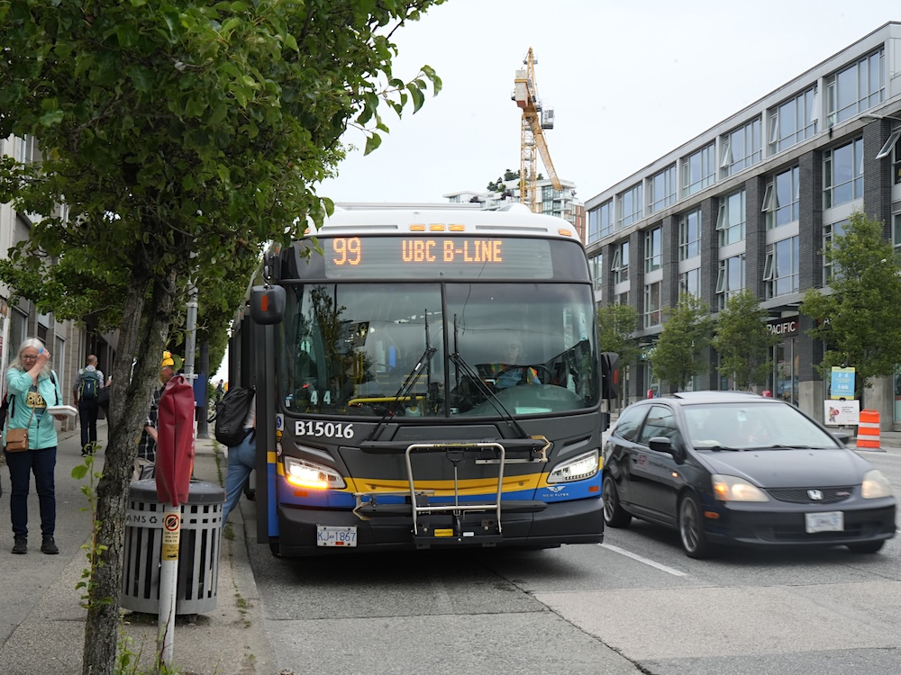 A 99 B-Line bus on a street in Vancouver. 