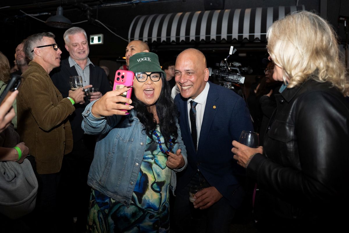 JB First Lady takes a selfie with Pete Fry, who was among the Vancouver Greens representatives speaking with journalists, candidates, volunteers, and supporters as results came in. Photo for The Tyee: Kayla Isomura.
