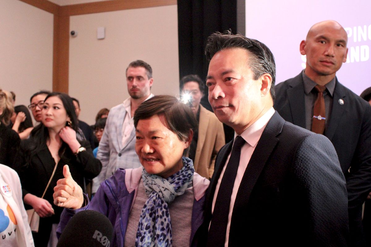 Vancouver Mayor Ken Sim poses with supporters after his concession speech on October 17, 2026. Photo for The Tyee: Jen St. Denis.