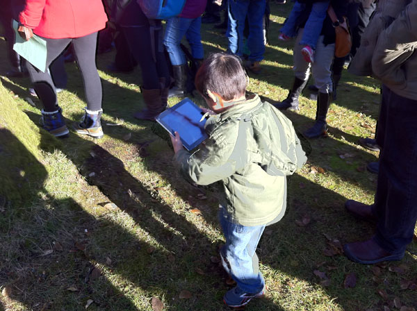 Child with iPad at Idle No More