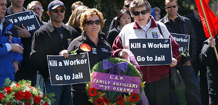 582px version of kill-worker-rally.jpg