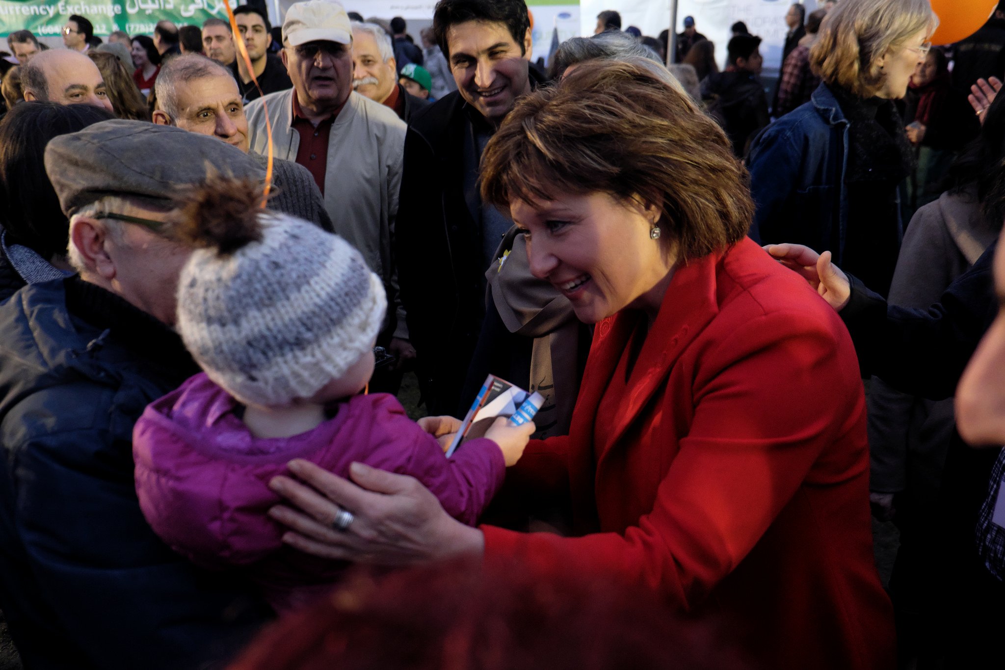 Christy Clark with a baby