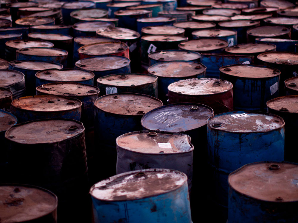 Rusty old oil barrels. Lots of rusty old oil barrels.