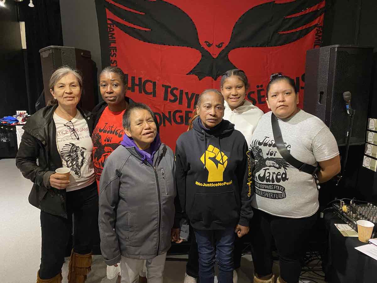 Families impacted by police killings stand together. From left to right: Laura Holland, Nhora Aust, Carol Manson, Claudette Clayton-Beals, Inktsu Manson and Laura Manson.