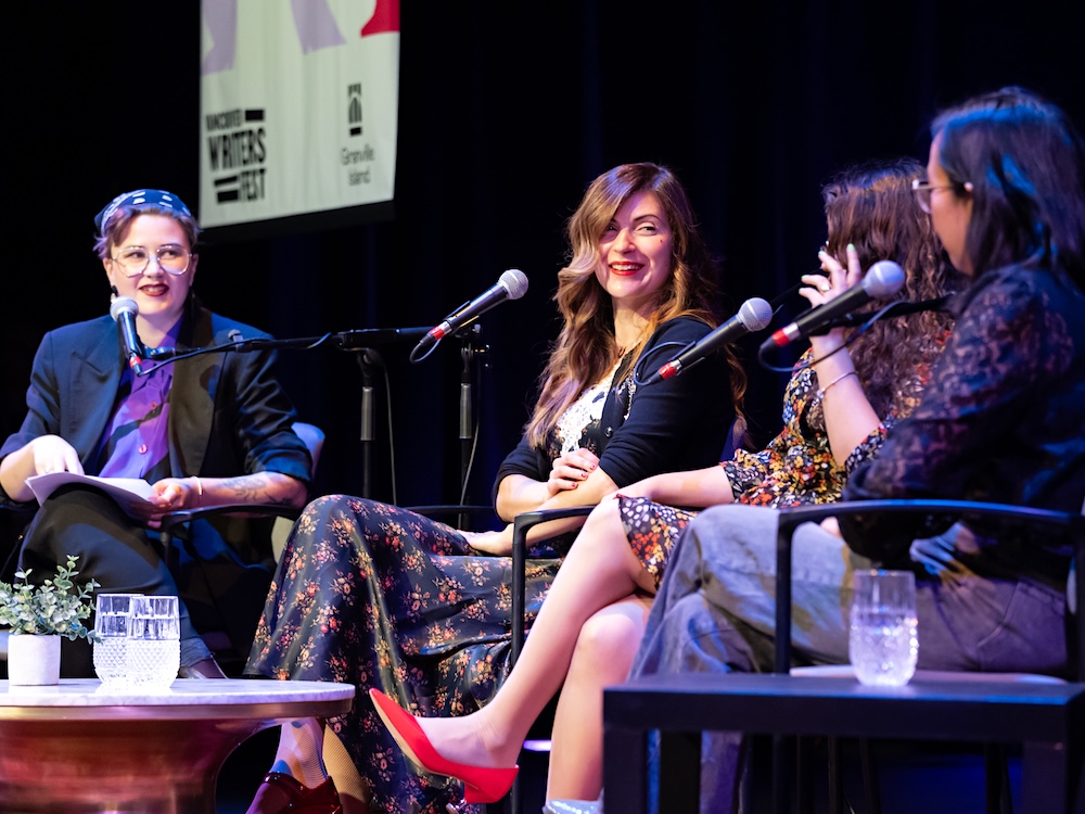 Four speakers sit onstage at the 2025 Vancouver Writers Fest.