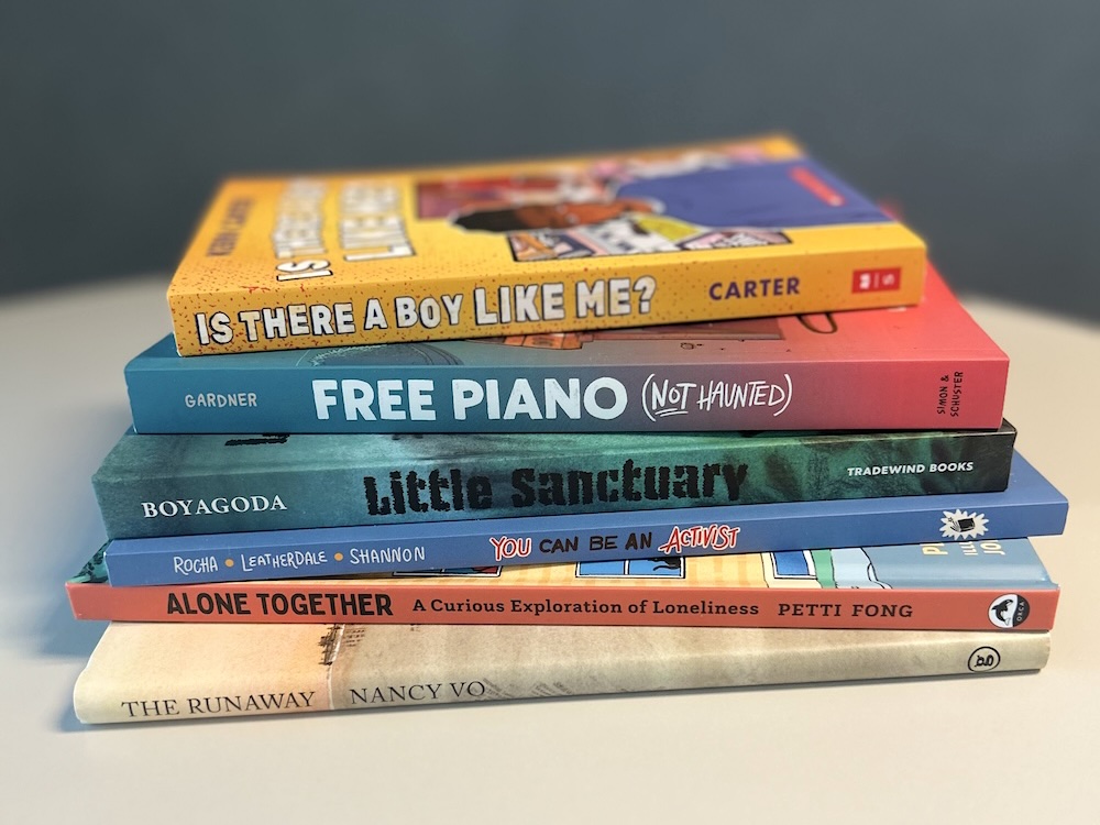 A stack of books featuring six Canadian titles for kids and teens.